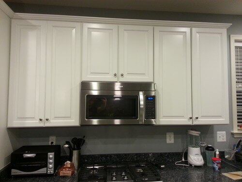 Storage Space in Interior Design - Floating microwave oven